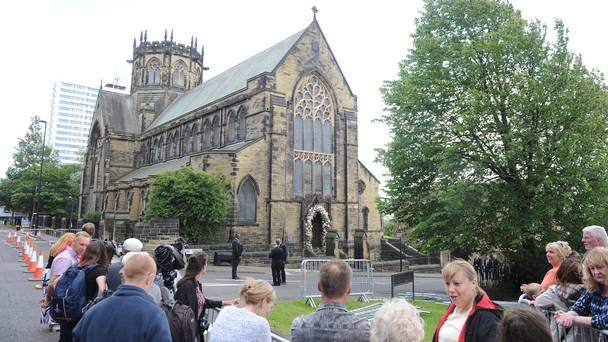 The public and media wait outside St Michael's Church Elswick ahead of the wedding of Declan Donnelly and Ali Astall