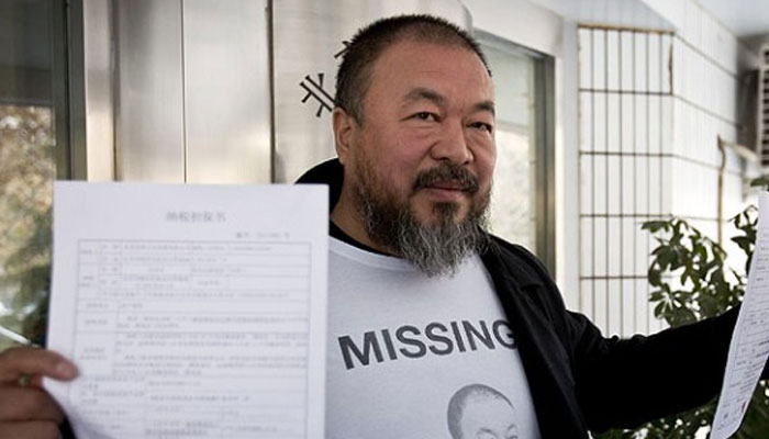 China artist Ai Weiwei says Britain restricted his visa