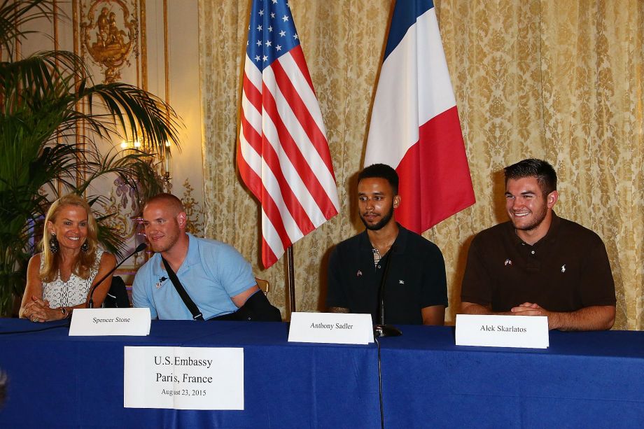 U.S. Ambassador Jane Hartley Spencer Stone Anthony Sadler and Alek Skarlatos address the media