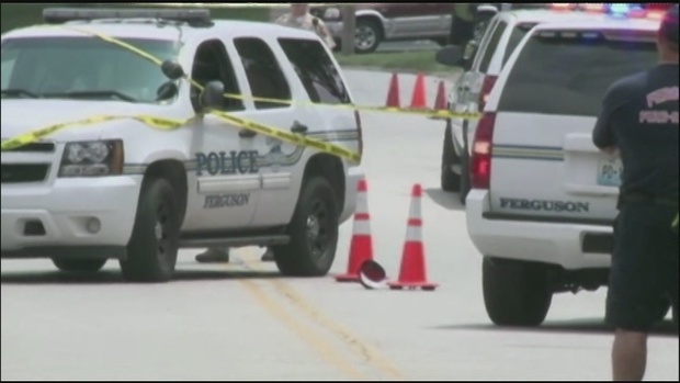 Michael Brown Sr urges protesters to step up efforts on shooting anniversary