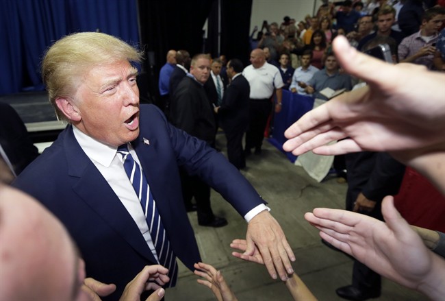 Republican presidential candidate Donald Trump meets supporters after addressing a GOP fundraising event Tuesday Aug. 11 2015 in Birch Run Mich. Trump attended the Lincoln Day Dinner of the Genesee and Saginaw county Republican parties