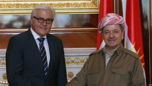 German Foreign Minister Frank Walter Steinmeier left shakes hands with Massoud Barzani the president of the Kurdistan regional government in Iraq before a meeting in Erbil