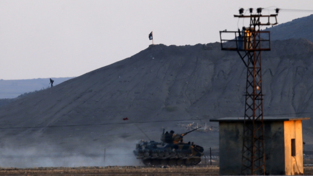 Kurdish police fortify a checkpoint at the entrance to the oil rich city of Ramlan around which oil fields are located in Syria's mainly Kurdish northeastern area on the border with Turkey and Iraq