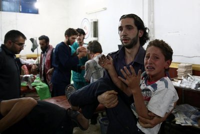 Syria: 82 Killed As 'Government Attacks Market'