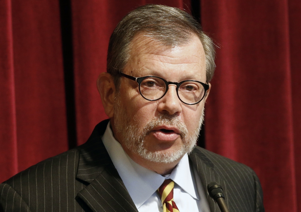 University of Minnesota President Eric Kaler announces the resignation of athletic director Norwood Teague Friday Aug. 7 2015 in Minneapolis. Kaler said in an email to staff that Teague's resignation followed reports that he had sexually harassed