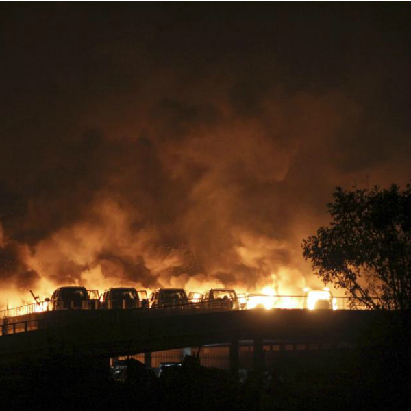 China is investigating the cause for Tianjin blasts while top firms are assessing the damages caused to their operations