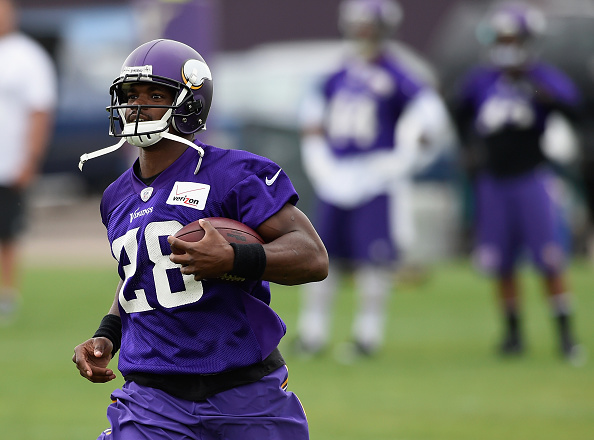 EDEN PRAIRIE MN- JUNE 4 Adrian Peterson #28 of the Minnesota Vikings runs a drill during practice