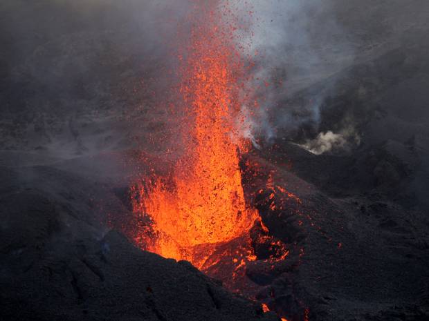 Team probing MH370 plane wreckage on Reunion island flee for lives as volcano