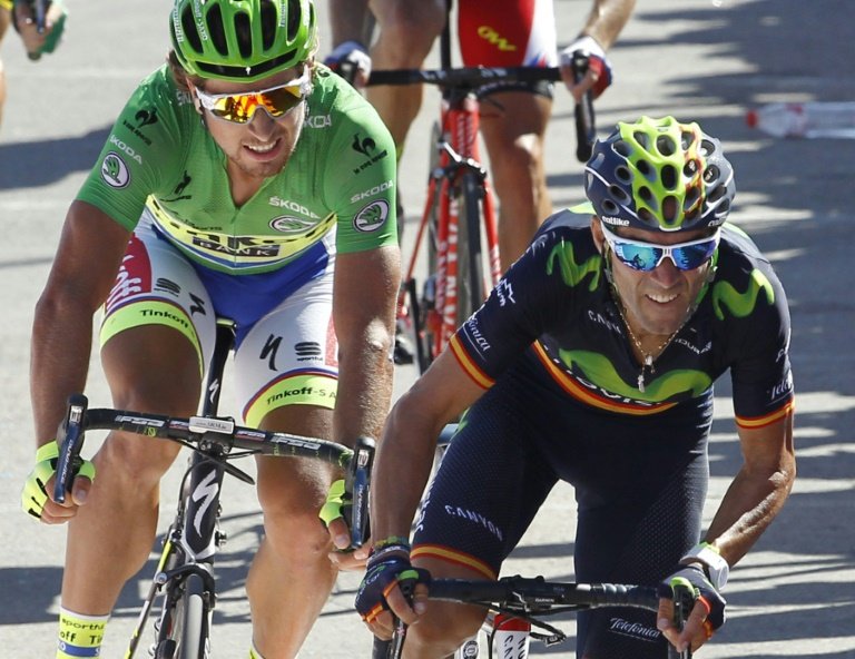 Movistar's Spanish cyclist Alejandro Valverde, ahead of Tinkoff-Saxo's Slovenian cyclist Peter Sagan crosses the finish line to win the fourth stage of the 2015 Vuelta Espana cycling tour in Vejer de la Frontera