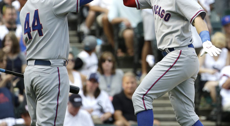 RETRANSMISSION TO CORRECT YEAR Chicago Cubs&#39 Chris Coghlan right celebrates with Anthony Rizzo after hitting a solo home run during the fifth inning of an interleague baseball game against the Chicago White Sox Friday Aug. 14 2015 in Chicago