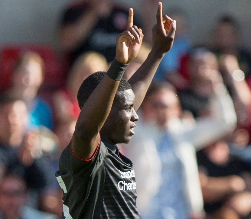 Liverpool's Seyi Ojo celebrates scoring his side's second and winning goal against Swindon Town during a friendly match at the County Ground