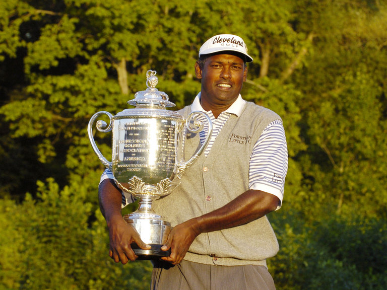 Vijay Singh holds the Wannamaker Trophy after winning here 11 years ago