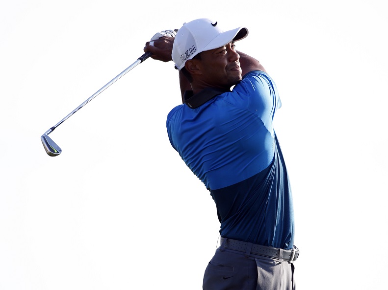 Tiger Woods hits his tee shot on the 17th hole during the continuation of the second round of the 2015 PGA Championship golf tournament at Whistling Straits. – Reuters pic