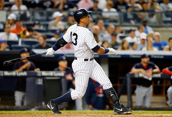 NEW YORK NY- AUGUST 20 Alex Rodriguez #13 of the New York Yankees follows through on a fourth inning home run against the Cleveland Indians at Yankee Stadium