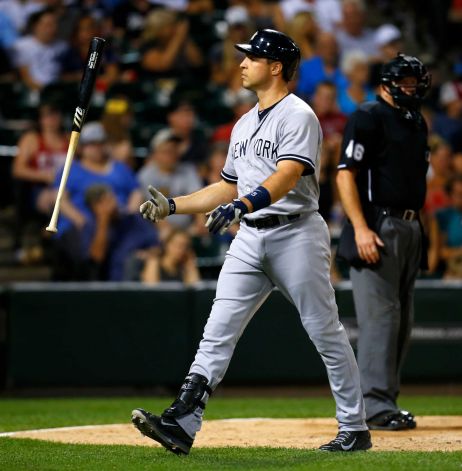 New York Yankees first baseman Mark Teixeira flips his bat after striking out in the during the eighth inning of a baseball game against the Chicago White Sox in Chicago on Saturday Aug. 1 2015. ORG XMIT CXS128