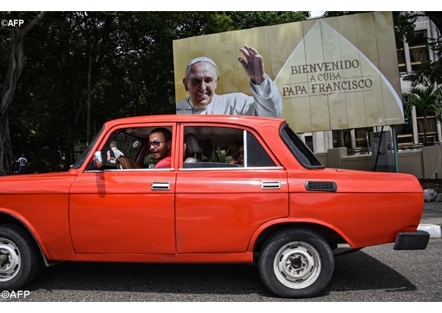 A poster of Pope Francis in Havana Cuba as the people await his visit- AFP