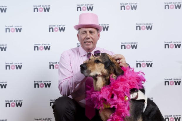 And your little dog too Dennis Robertson and Mr Q wearing pink to support women with breast cancer