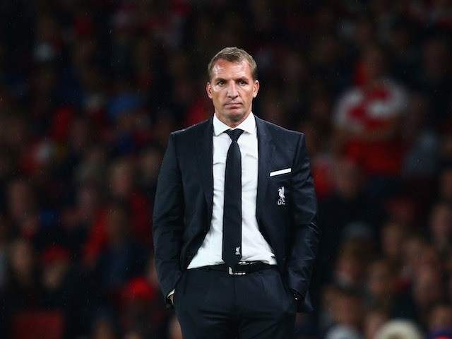 Liverpool manager Brendan Rodgers watches on as his side take on Arsenal