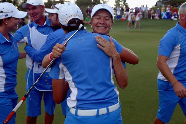 Getty Images

Scotland's Catriona Matthew is hailed after sinking the winning putt for Europe in the Solheim Cup against the USA in August