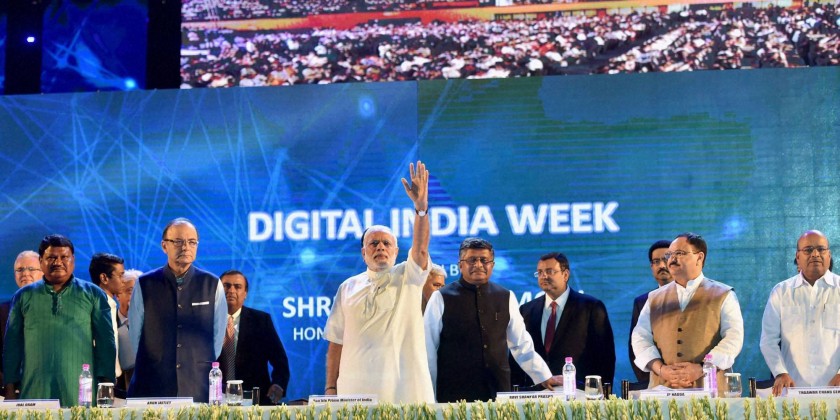 New Delhi Prime Minister Narendra Modi with Union ministers waves at the launch of Digital India Week in New Delhi on Wednesday. PTI