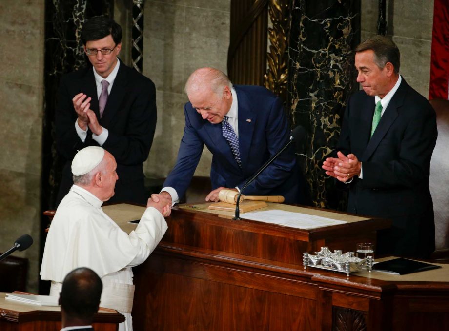 Vice President Joe Biden shakes hands with Pope Francis on Capitol Hill in Washington Thursday Sept. 24 2015 prior to the pope's address to a joint meeting of Congress making history as the first pontiff to do so. House Speaker John Boehner of Ohio