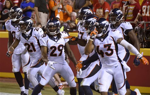 Denver Broncos cornerback Bradley Roby celebrates with teammates after he returned a fumble by Kansas City Chiefs running back Jamaal Charles for a touchdown during the second half of an NFL football game in Kansas City Mo. Thursday Sept. 17 2015