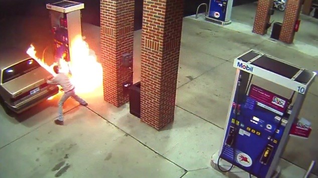 Home News Petrol station fire ERUPTS after man tries to kill spider with a