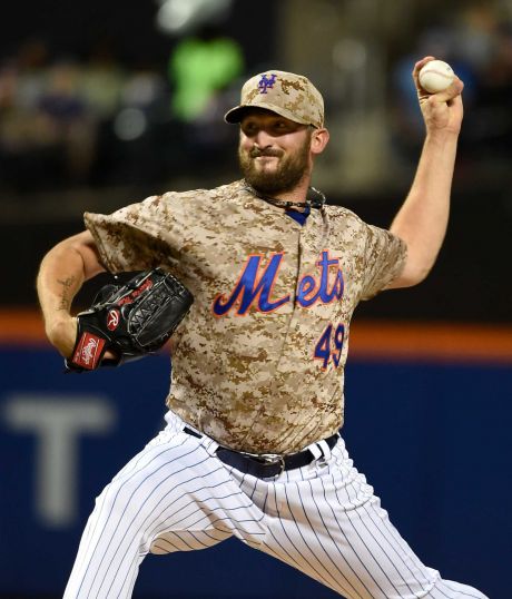 New York Mets starter Jonathon Niese pitches against the Atlanta Braves in the first inning of a baseball game Monday Sept. 21 2015 in New York