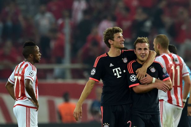 Muller time The German pair both found the net in Greece