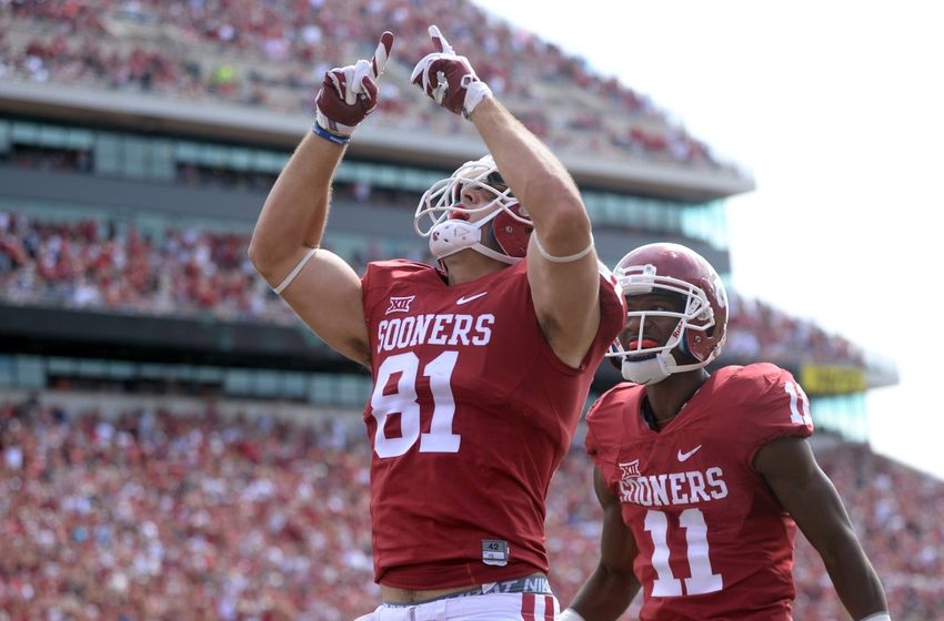 Sooners Survive Tulsa's Air Attack to Win by Two Touchdowns 52-38