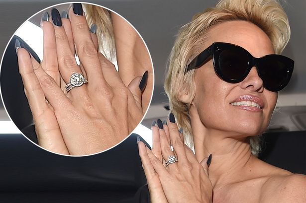 Pamela Anderson Finds Homeless Woman in her Home Wearing Infamous 'Baywatch