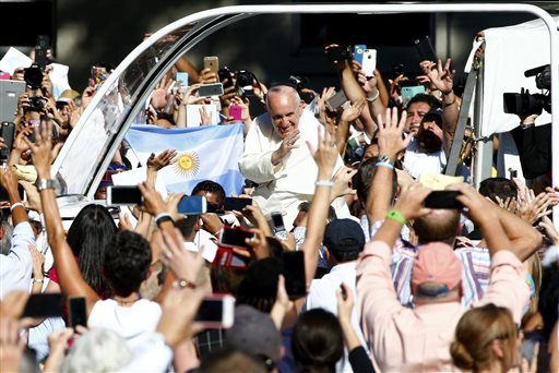 Pope Francis arrives in the popemobile at the Basilica of the National Shrine of the Immaculate Conception in Washington Wednesday Sept. 23 2015 for the Canonization Mass for Junipero Serra