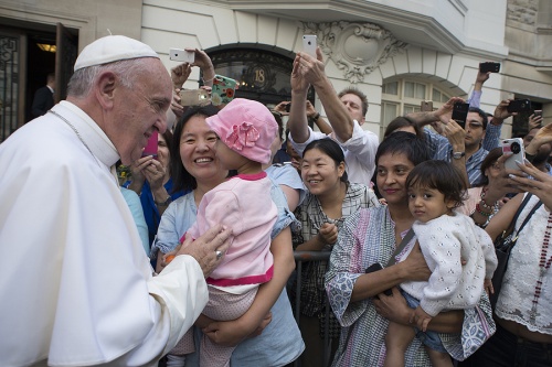 Pope Francis greets a mother and daughter during a special meeting with sick children in New York City Sept. 25 2015. Credit L'Osservatore Romano