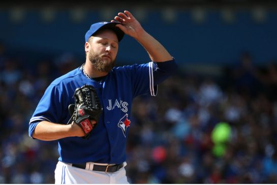 Mark Buehrle gave up three runs in six innings against Boston on Sunday and out of character hurt himself with his fielding