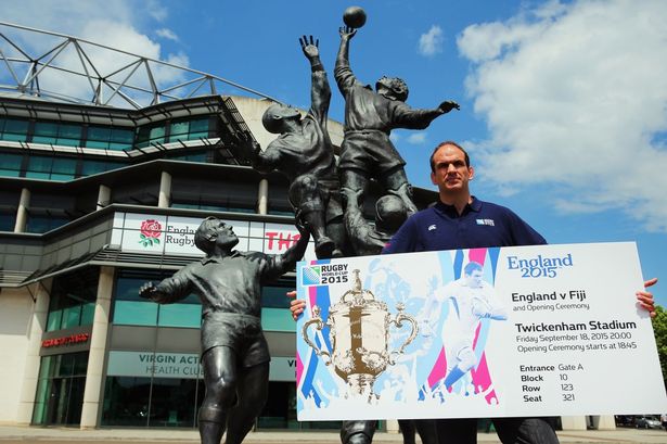 Rugby World Cup 2003 winning captain Martin Johnson shows off the ticket design for the Rugby World Cup 2015 at Twickenham Stadium