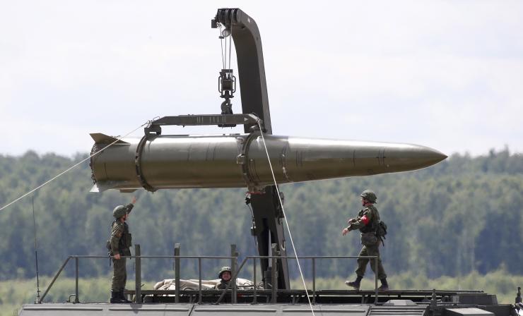 Russian troops unloading Iskander missiles