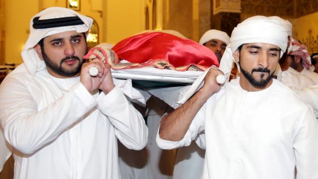 Sheikh Rashid's body is carried during his funeral at a mosque in Dubai