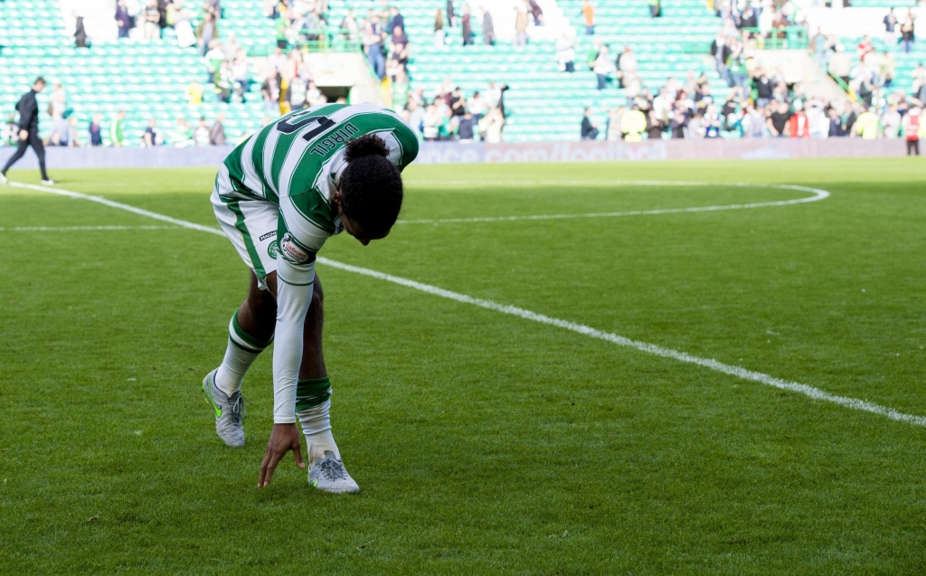 29/08/15 LADBROKES PREMIERSHIP. CELTIC v ST JOHNSTONE . CELTIC PARK- GLASGOW. Celtic defender Virgil Van Dijk touches the turf at Celtic Park after what could be his last game for the club