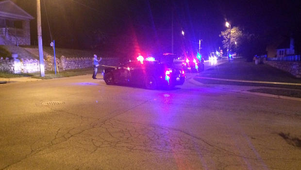 Scene in Kansas City Kansas after car crash that resulted from rolling gun battle on night