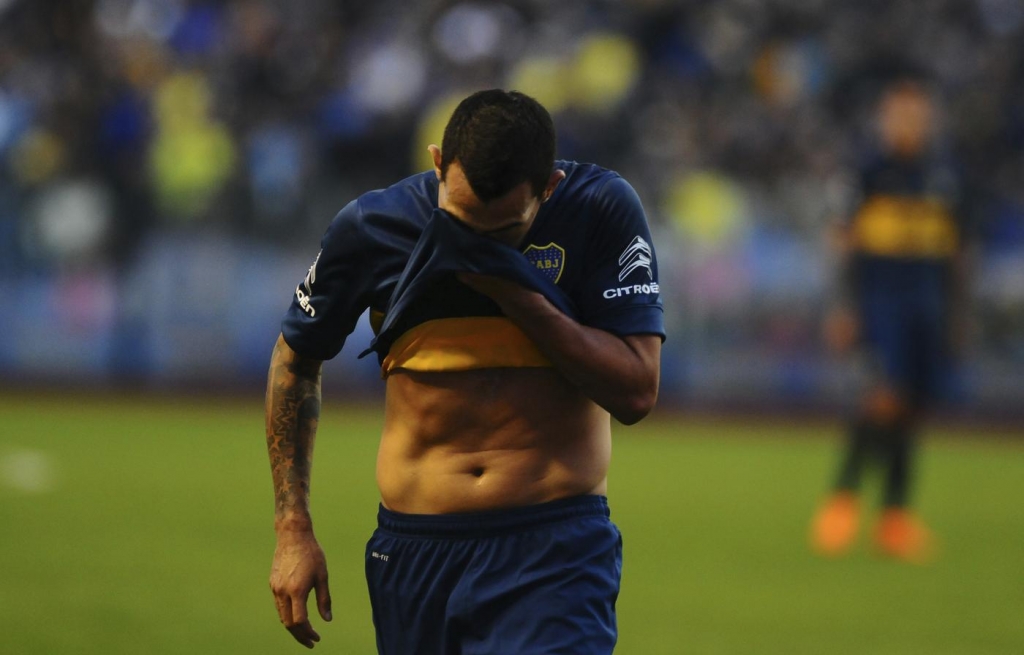 Carlos Tevez apologises for horrific leg-breaking tackle