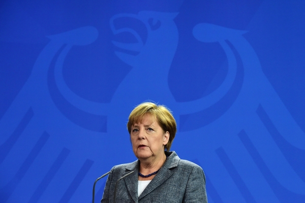 Threats wrong way to get EU deal on migrant quotas: Merkel