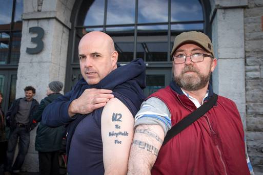 U2 fans Patrick Coughlan Artane and Dave Griffith Goatstown queue outside the 3 Arena for tickets for U2's upcoming gigs in the 3 Arena which go on sale at 9am on Monday morning