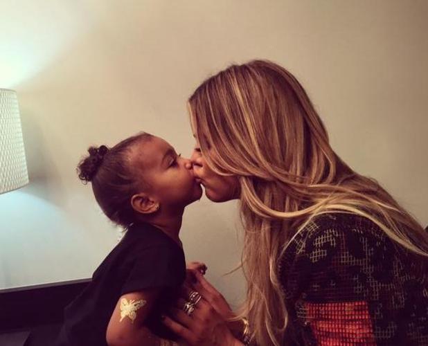 Khloe Kardashian kisses niece North West 26 September 2015