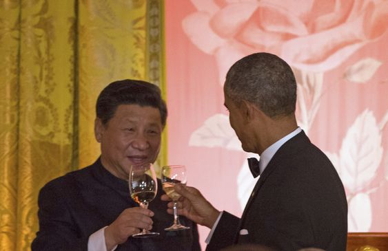 Jinping and President Barack Obama toast during a State Dinner Friday Sept. 25 2015 in the East Room of the White House in Washington