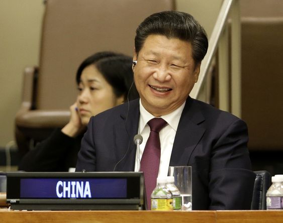 Jinping laughs during a meeting on gender equality and women's empowerment at United Nations headquarters Sunday Sept. 27 2015