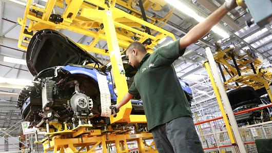 A Range Rover Sport SUV on the production line at car manufacturing plant in Solihull U.K