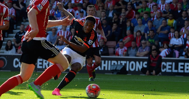 SOUTHAMPTON ENGLAND- SEPTEMBER 20 Anthony Martial of Manchester United scores their first goal during the Barclays Premier League match between Southampton and Manchester United at St Mary's Stadium