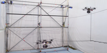 Drones build rope bridge that humans can cross (video)