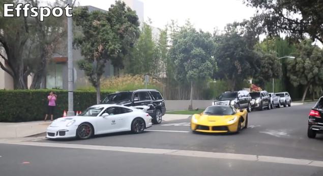 The yellow Ferrari La Ferrari and white Porsche 911 GT3 were filmed running stop signs in Beverly Hills