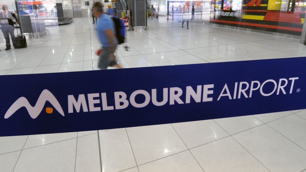 A controversial US anti-abortion activist is being held by Customs officials at Melbourne Airport